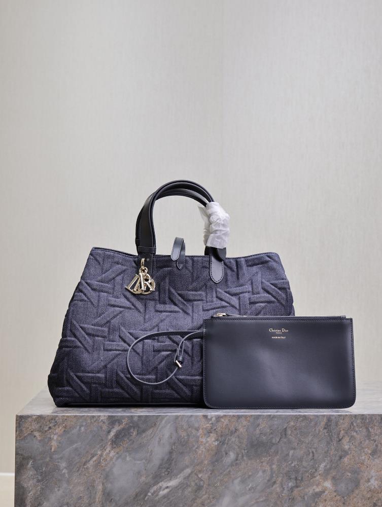 Large Dior Toujours handbag denim pressed rattan gridThis Dior Toujours handbag is casual practical and unique Crafted with blue denim fabric and o