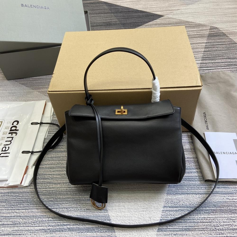 0 Balenciaga has shipped outRodeo black handbag with vintage gold metal accessories inspired by a lot of dystopian coolness and vintage effects feat