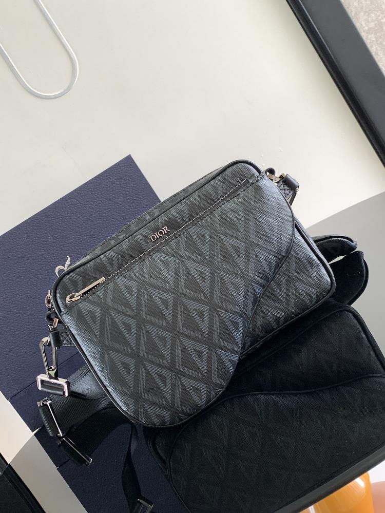 This saddle three piece handbag is designed to be eyecatching and versatile Crafted with black CD Diamond patterned canvas inspired by Dior archive