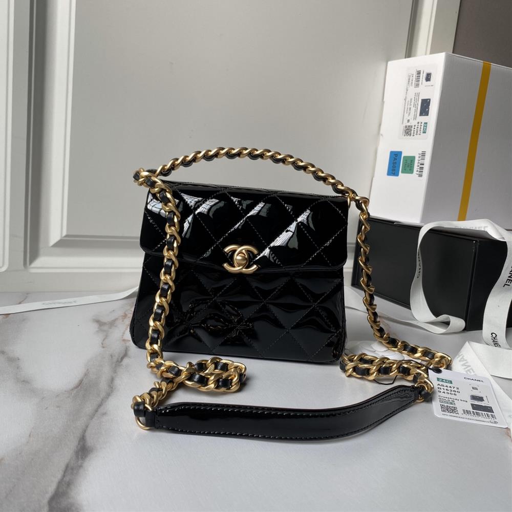 Lacquered leather 24S Chanel AS4472 exudes luxury and luxury with a highend texture and exquisite bag Black leather paired with gold elements looks