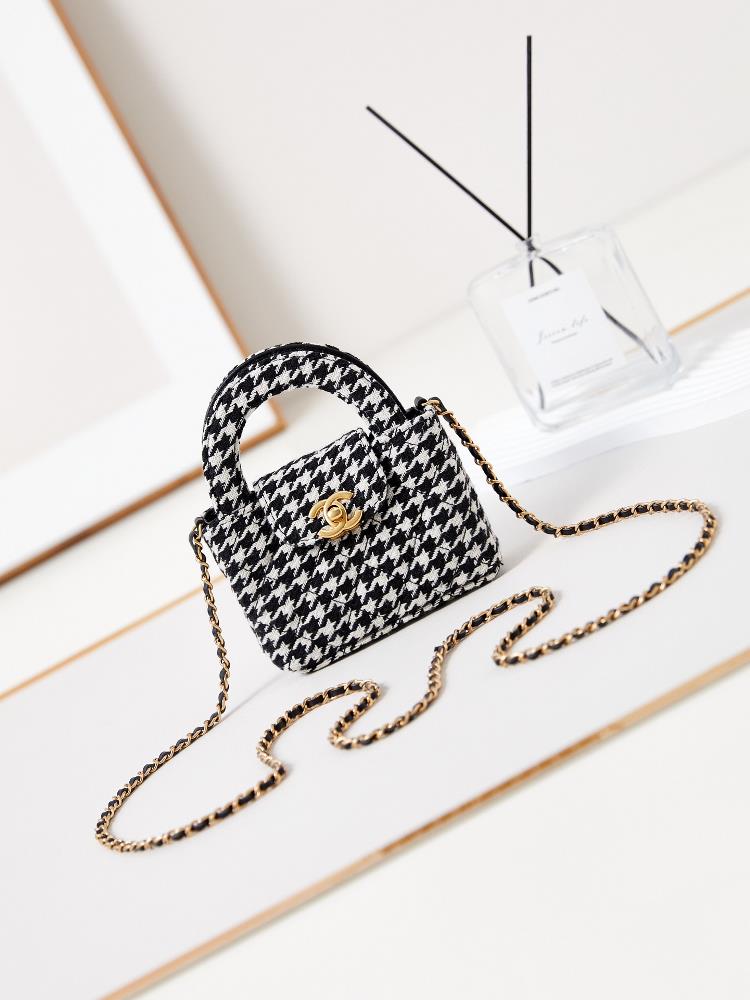 23K Kelly Handle Bag with Thousand Bird Grid Mini EditionFashion is a cycle and the popular vintage Kelly has been redesigned and revitalized by Chan