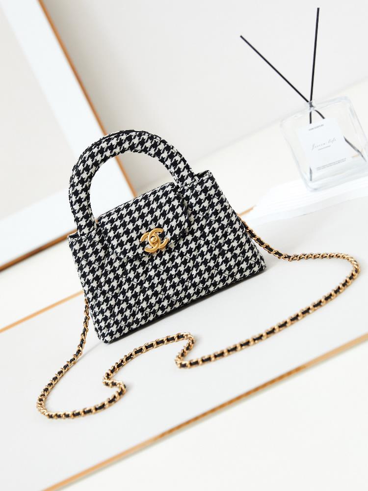 23K Kelly Handle Pack with Thousand Bird Grid ClothFashion is a cycle and the popular vintage Kelly has been redesigned and revitalized by Chanel Th