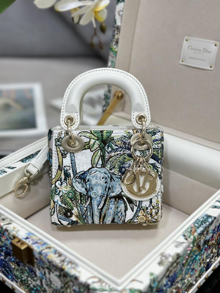 The Lady Dior ultra mini toplevel limited edition set is green in color with lamb tendon inside carefully crafted by hand and the storage box rein