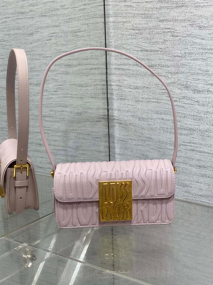 Miss Dior Flip up HandbagThis Miss Dio r flip up handbag is a new addition to the 2024 winter ready to wear collection reinterpreting the modern an