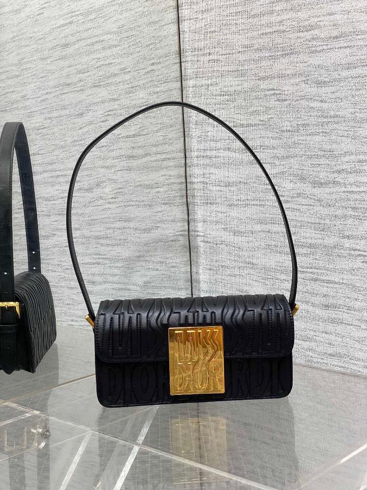 Miss Dior Flip up HandbagThis Miss Dio r flip up handbag is a new addition to the 2024 winter ready to wear collection reinterpreting the modern an