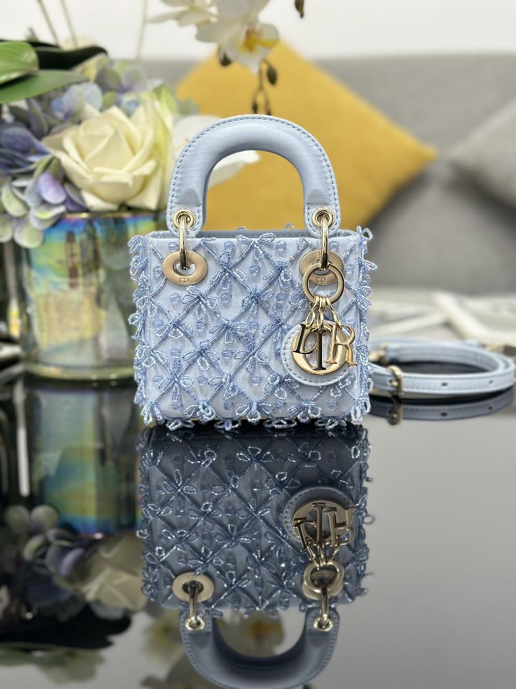 Lady Dior Mini Embroidered Ice Blue Beads crafted with silk satin fabric complemented by ice blue beads beaded embroidery and a light gold finish