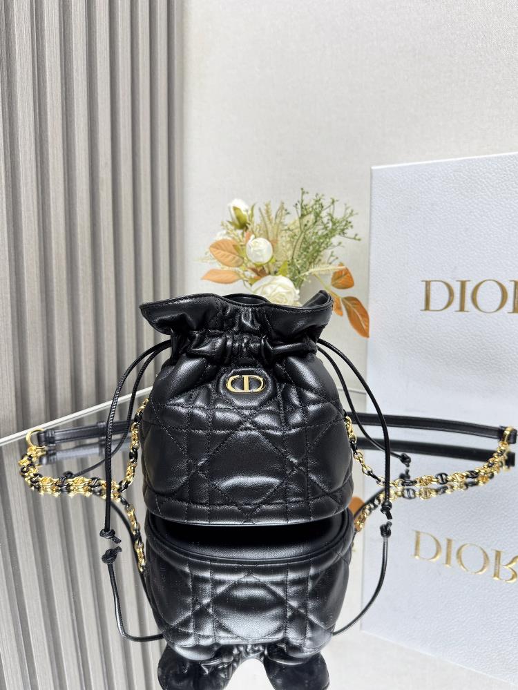 This mini drawstring bucket bag is a new addition to the early spring ready to wear collection of 2025 enriching the Dior Caro collection with a casu