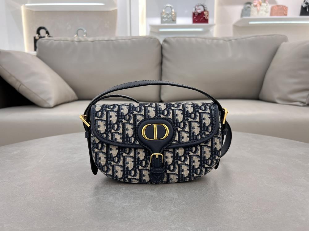 This Dior Bobby EastWest handbag is a new addition to the early spring collection of 2025 featuring elegant lines and symmetrical proportions to rein