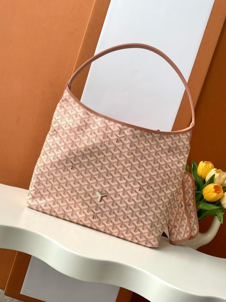 As a limited edition for 2024 the BOHEME HOBO handbag features a unique pearl colored GOYARDINE canvas with a rainbow like shimmering effect This ex