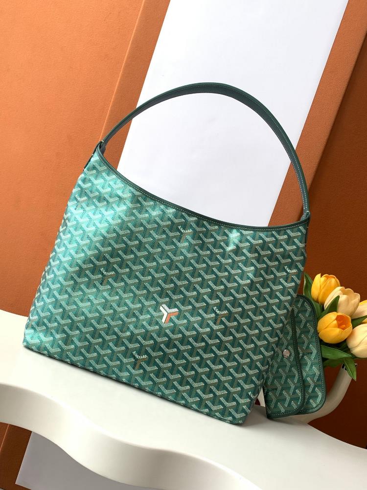 As a limited edition for 2024 the BOHEME HOBO handbag features a unique pearl colored GOYARDINE canvas with a rainbow like shimmering effect This ex