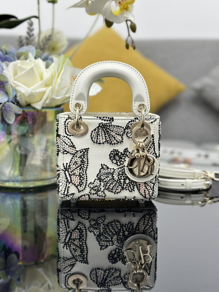 Lady Dior mini embroidered butterfly beads with sheep tendon inside carefully crafted in white leather embroidered with beads to create the iconic b