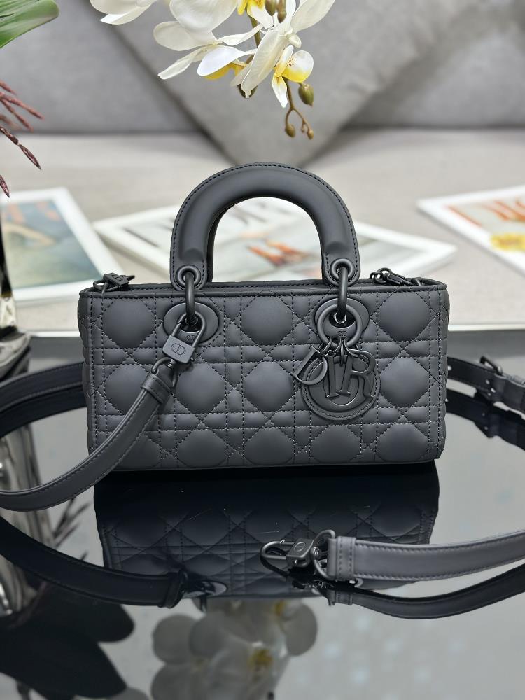 The Lady DJoy small horizontal grid frosted handbag highlights the minimalist aesthetics of the Lady Dior collection embodying Diors profound insigh