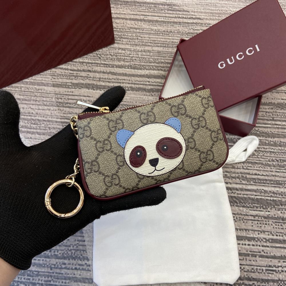 Equipped with a complete set of counter packaging and panda details GG mini wallet cute and playful animals such as cats dogs and pandas gather tog