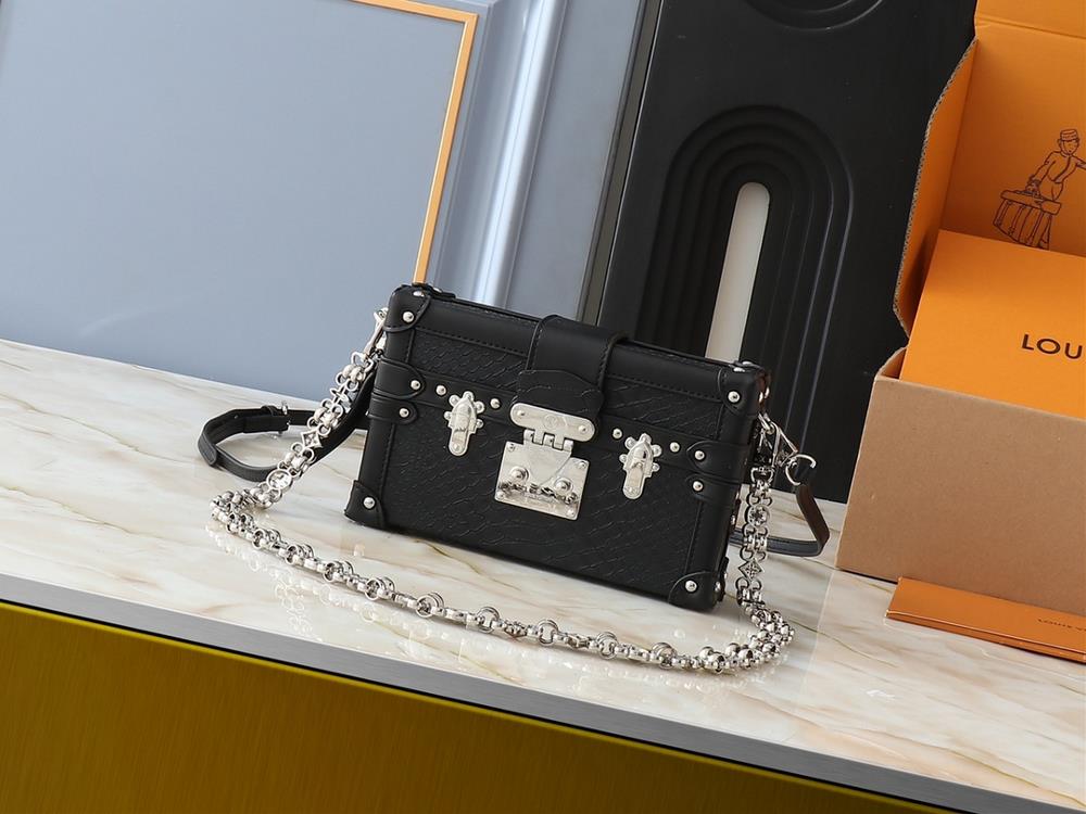 260 Upgraded Original M40273 M86286 This Petite Malle handbag is designed by Nicolas Ghesquire and features a small hard box configuration crafted fro