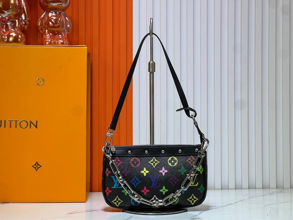 M13404 Black and White Pochette Accessories handbag is made of coated canvas with colorful MonogramThe pattern showcases the dynamic style of Louis Vu