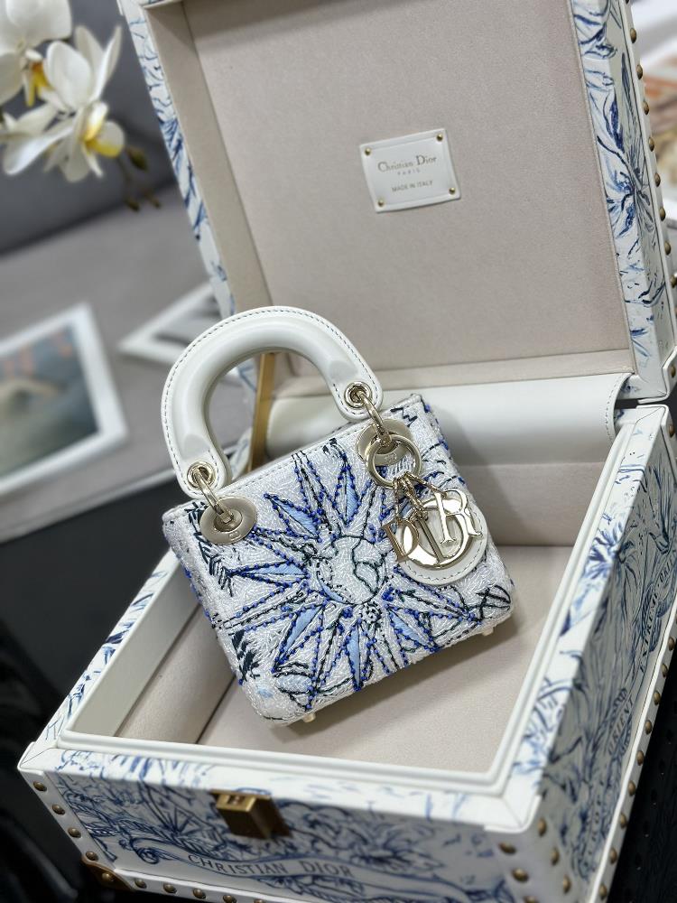 The Lady Dior Ultra Mini Top Limited Edition set is blue in color with lamb tendons inside carefully crafted by hand and the storage box reinterpre