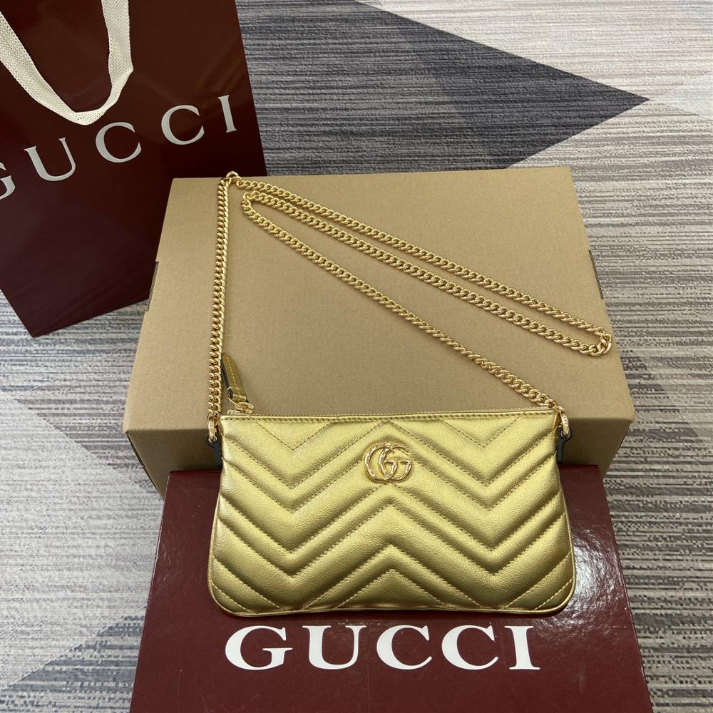 Gucci celebrates the gift giving season with a variety of dazzling items ranging from mirrored leather to sparkling crystals paired with a full set