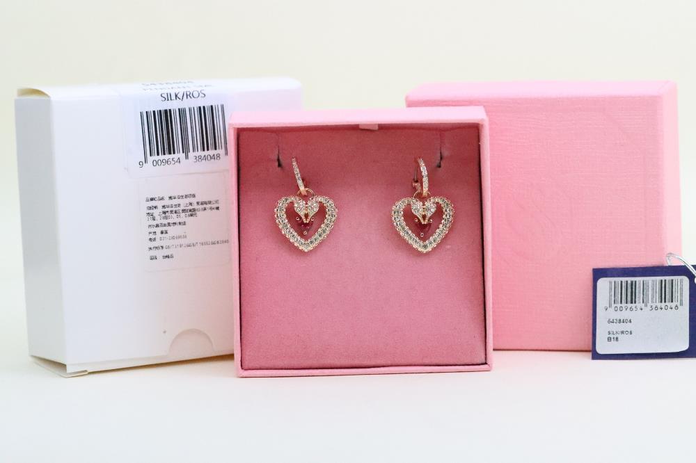 New Pink Diamond Love Double Swan EarringsIts romantic pattern is composed of Swarovski swans pieced together with two swans merging into one to form