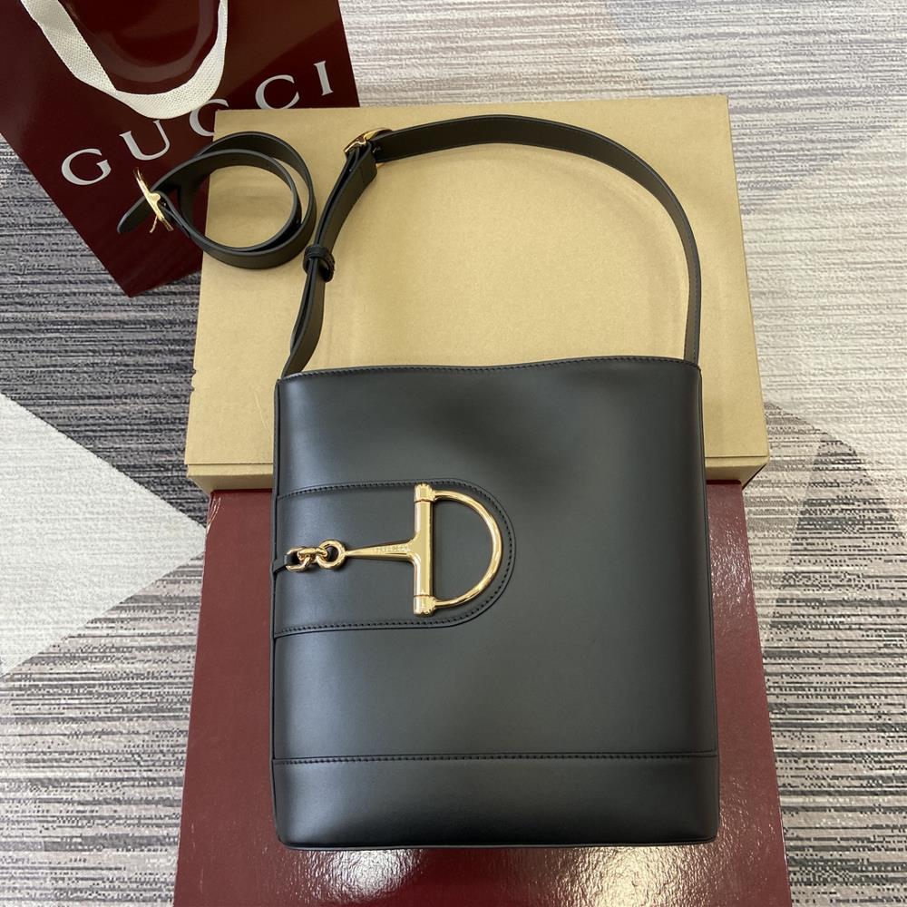 In the 2025 SpringSummer collection Gucci 73 is inspired by the archive bucket bag from the same year It adopts a contemporary horseshoe buckle har