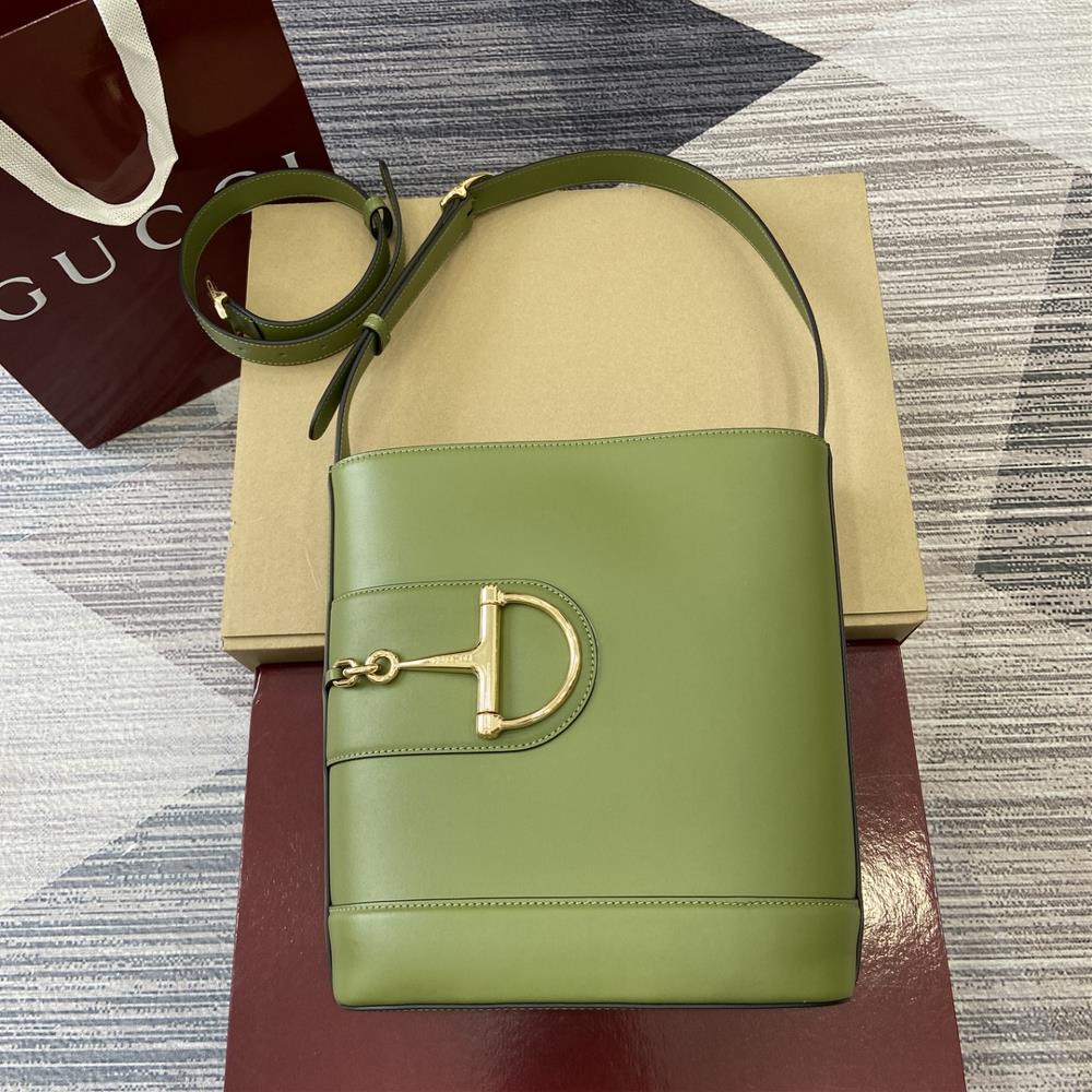 In the 2025 SpringSummer collection Gucci 73 is inspired by the archive bucket bag from the same year It adopts a contemporary horseshoe buckle har