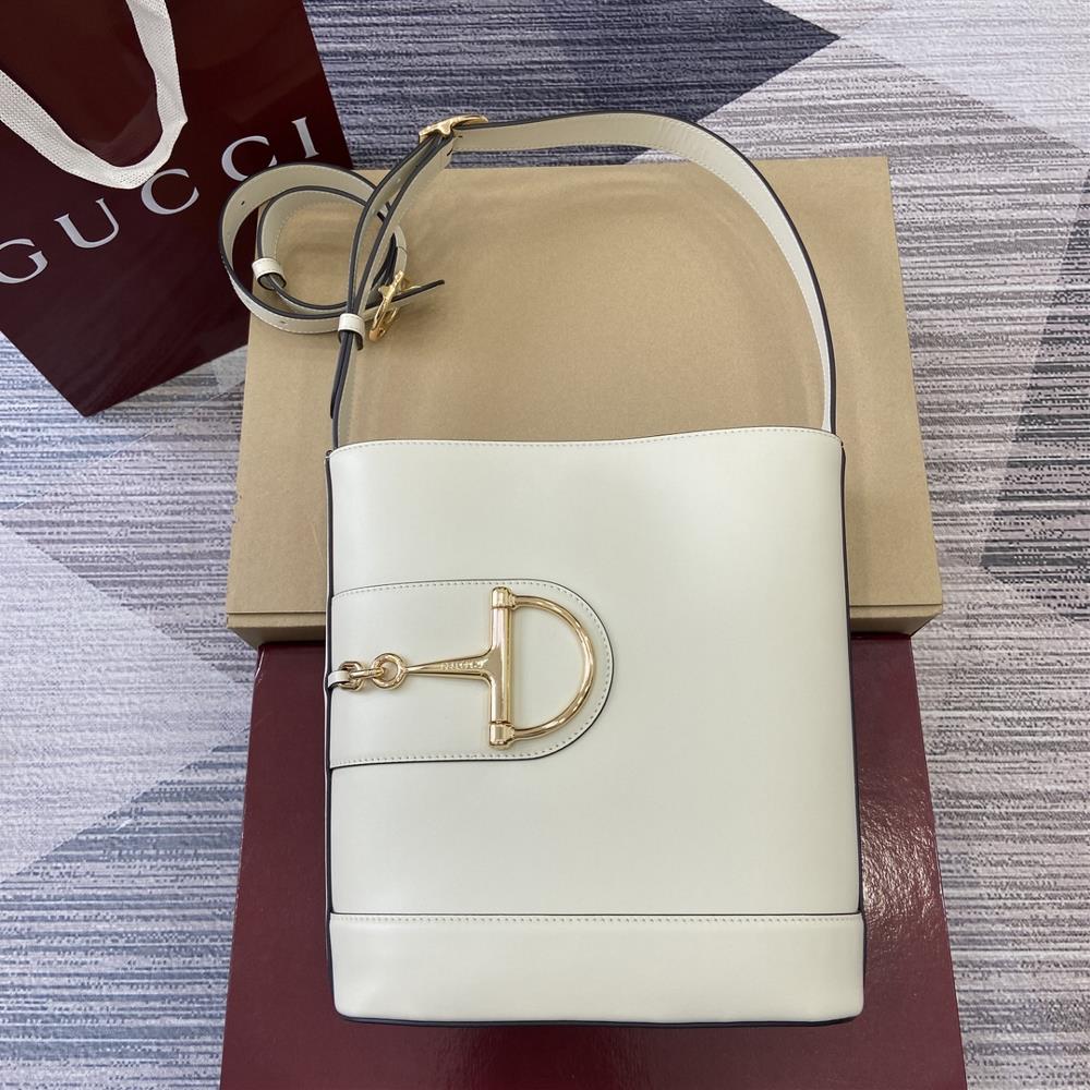 In the 2025 SpringSummer collection Gucci 73 is inspired by the archive bucket bag from the same year It adopts a contemporary horseshoe buckle har