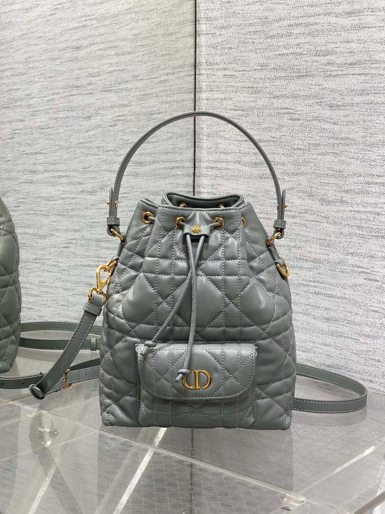 Small Dior Caro Bucket BagThis small Dior Caro bucket bag is a new product in the 20225 autumn ready to wear collection showcasing a fashionable an