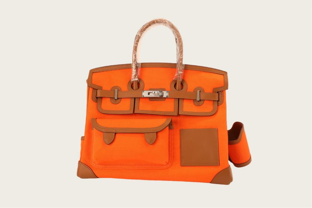 New color scheme for the cargo seriesPlatinum 35cargo series new color scheme gold brown swift leather with orange canvas multi pocket silver buckle
