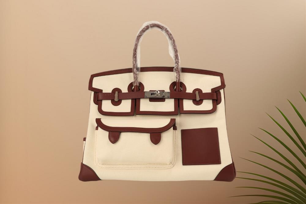 New color scheme for the cargo seriesPlatinum 35cargo series new color scheme jujube red swift leather patchwork beige canvas multi pocket silver buck