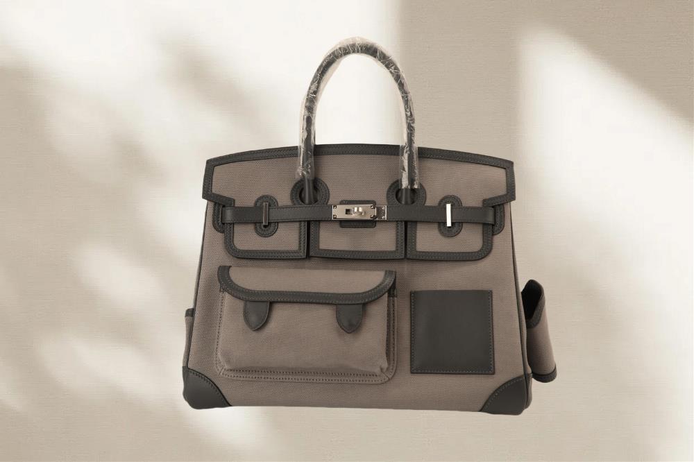 New color scheme for the cargo seriesPlatinum 35cargo series new color saddle red swift leather splicing deep coffee canvas multi pocket silver buckle