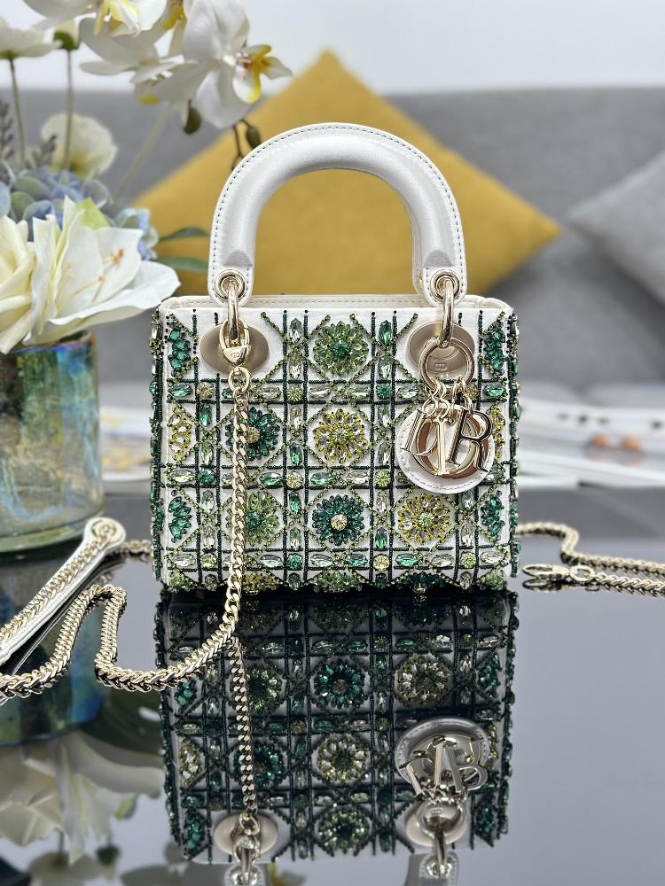 Lady Diors three grid embroidered white green diamonds are carefully crafted by hand from silk fabric with pearl embroidery creating the iconic vine