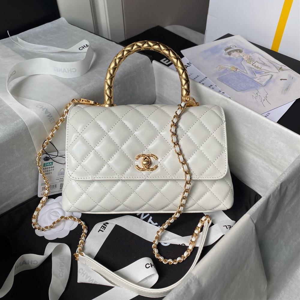 The Chanel 24a handmade visit series hit The 92990 cocohandle classic features a glossy cowhide metal handle design that sparkles with gold and exude