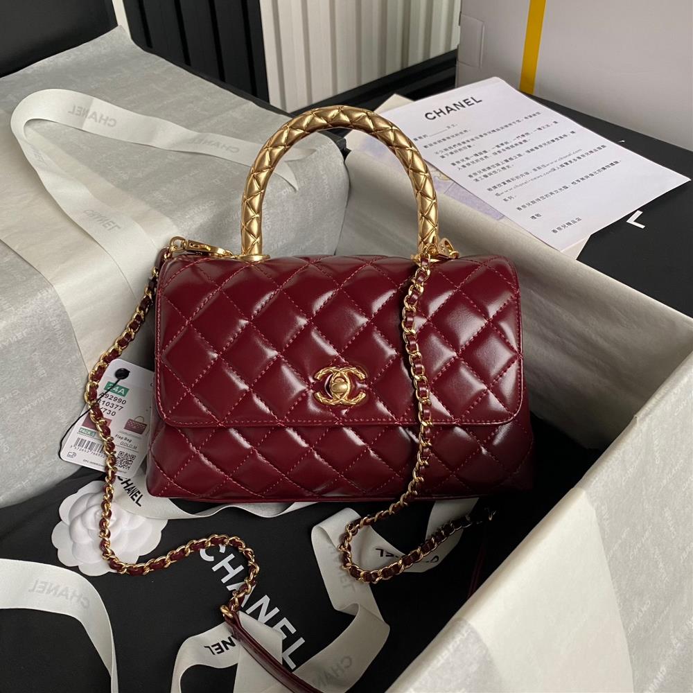 The Chanel 24a handmade visit series hit The 92990 cocohandle classic features a glossy cowhide metal handle design that sparkles with gold and exude