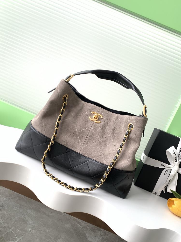 The focal point of the fashion show at the 25 year suede handbag workshop is a masterpiece that blends classic and innovative elements Inspired by Ch