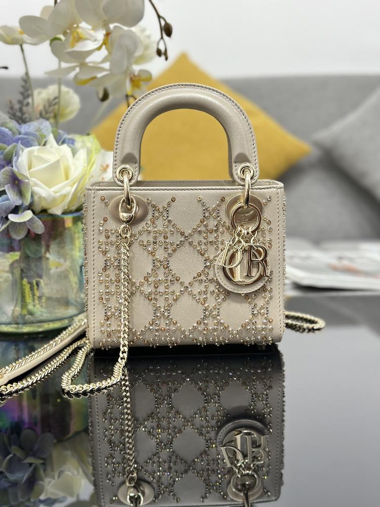Lady Diors three grid embroidered gold beads with lamb tendons inside are carefully crafted from cowhide leather and embroidered with a rattan grid
