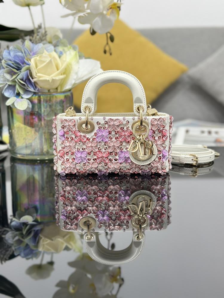 Lady DJoy ultra mini embroidered flower beads with lamb tendons inside carefully crafted in leather satin and paired with a light gold finish metal