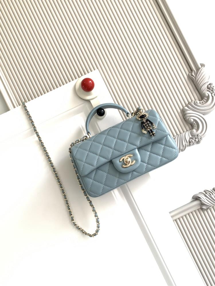 The latest 21K Mini CF handle handbag AS2431 features a classic diamond grille lid bag with a human head hanging decoration The exquisite classic cha