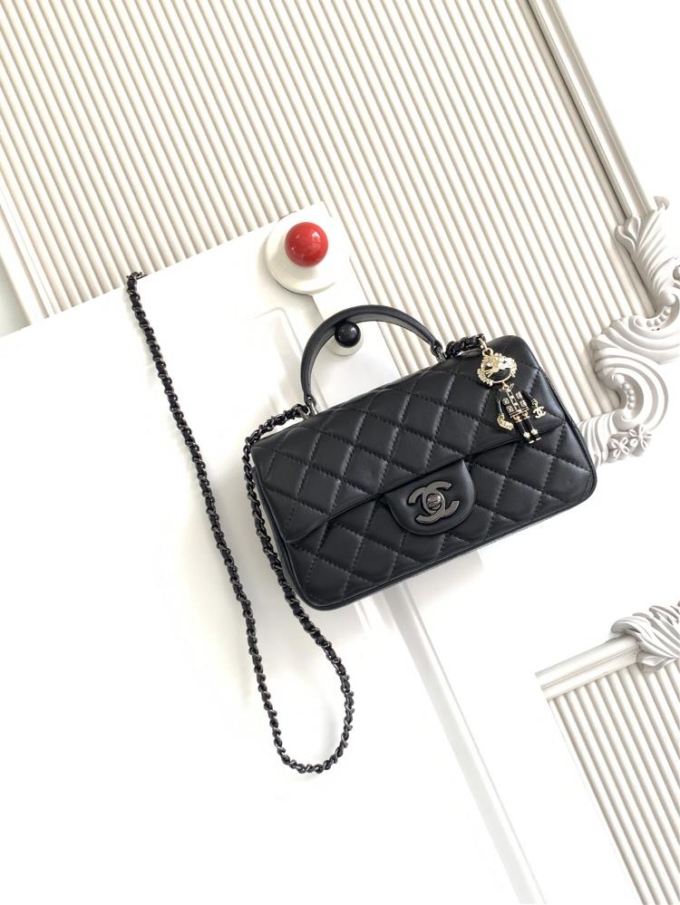 The latest 21K Mini CF handle handbag AS2431 features a classic diamond grille lid bag with a human head hanging decoration The exquisite classic cha