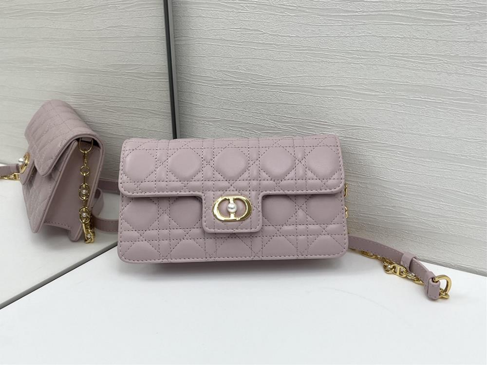 This Dior Jolie mini chain handbag is a new addition to the FallWinter 2025 ready to wear collection combining elegance and practicality Crafted wi