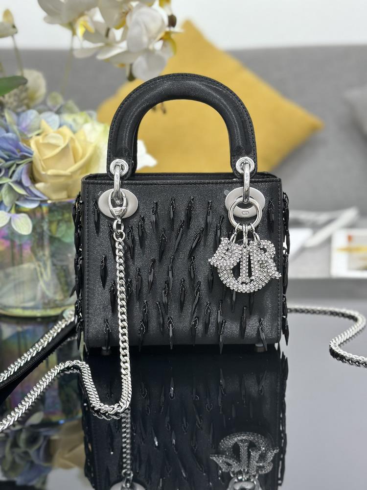 Lady Diors three grid embroidered bullet black beads are carefully crafted by hand using silk fabric with black bead embellishments embroidered by h