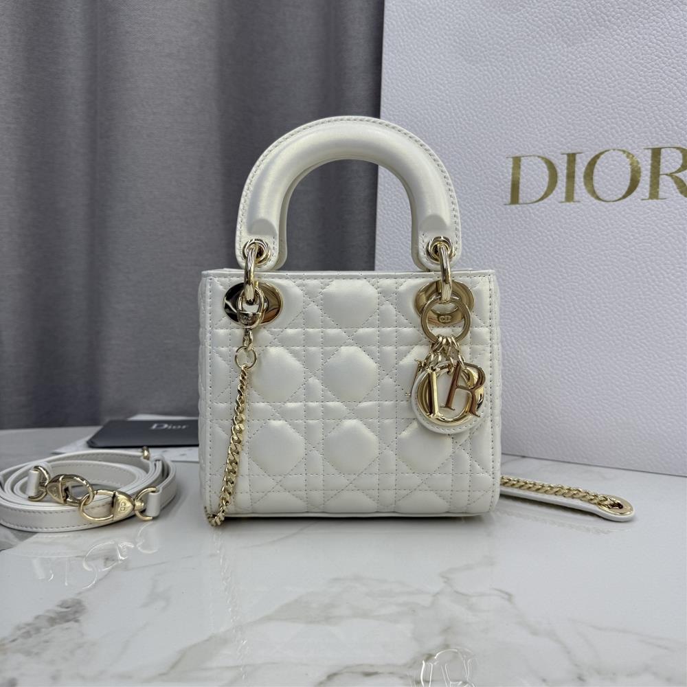 Triple Grid Pearl White Sheep Leather Gold Buckle Concubine Bag No M0505This Lady Dior handbag embodies Diors profound insight into elegance and bea