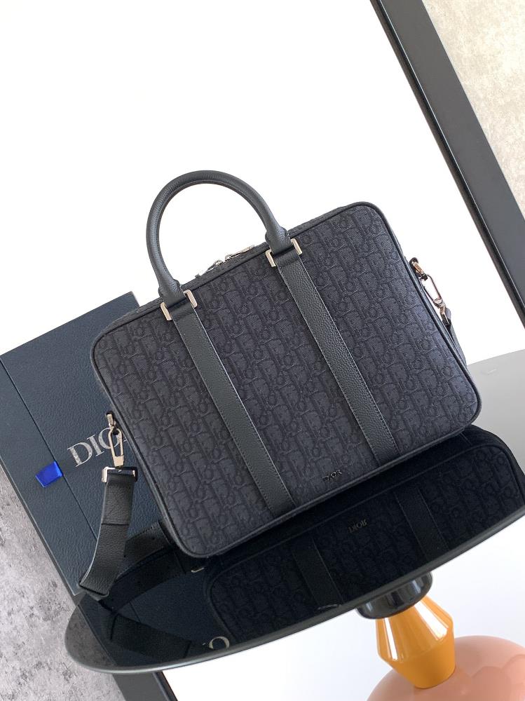 The Dior briefcase blends classic elegance with Diors highend ordering spirit The rigid contour is carefully crafted with black Oblique printed fa