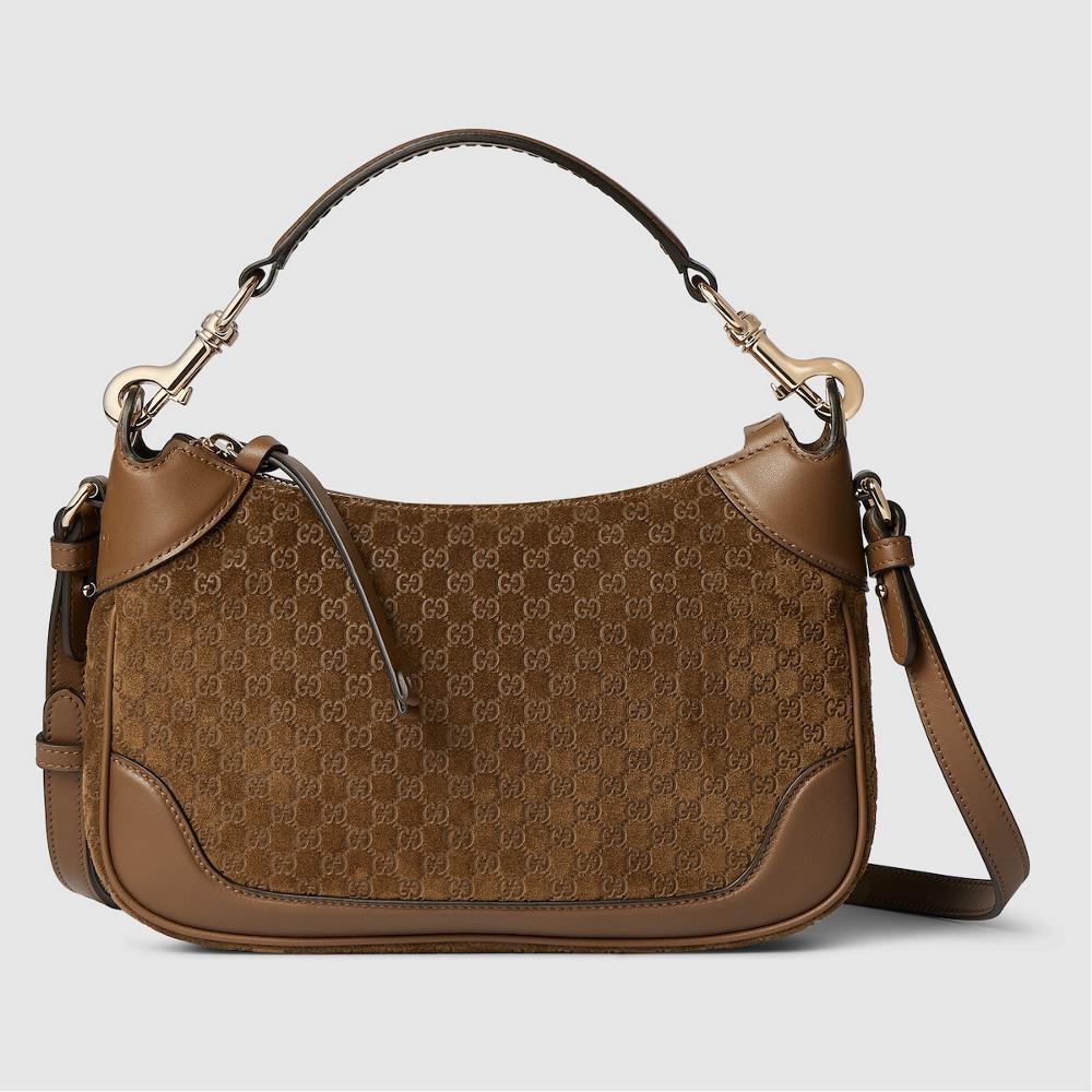 Introduction The 2026 autumn and winter collection reinterprets the Jackie 1961 shoulder bag series with the Body double buckle series carrying the