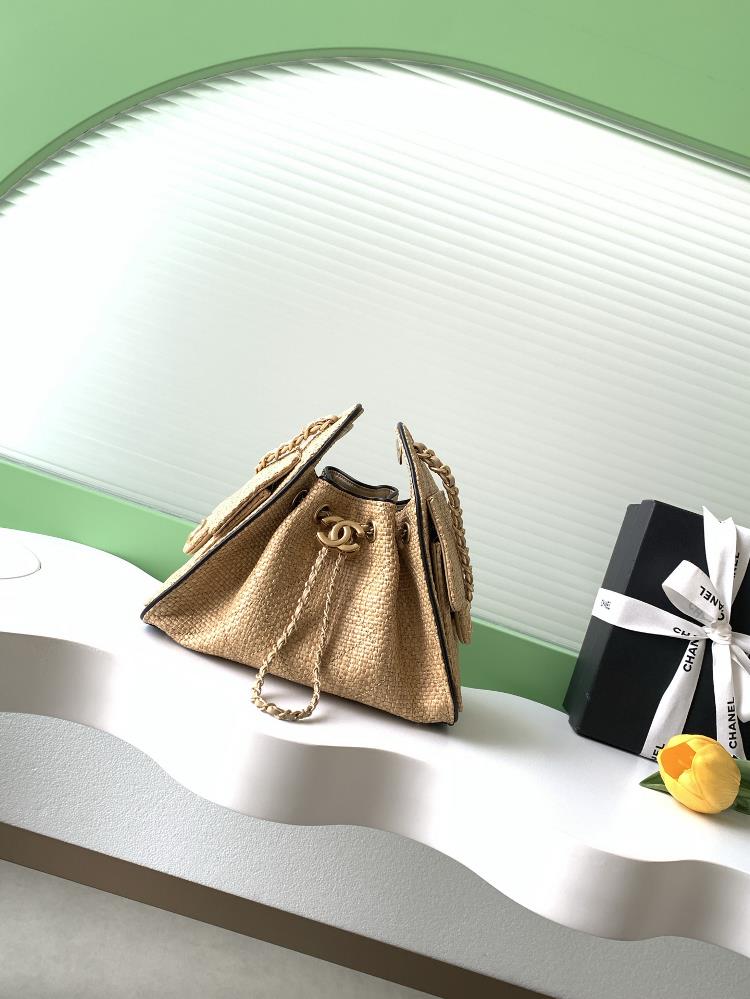 26pbag series grass woven bucket bag natural grass woven material with black leather edge decoration full of vacation atmosphere drawstring design